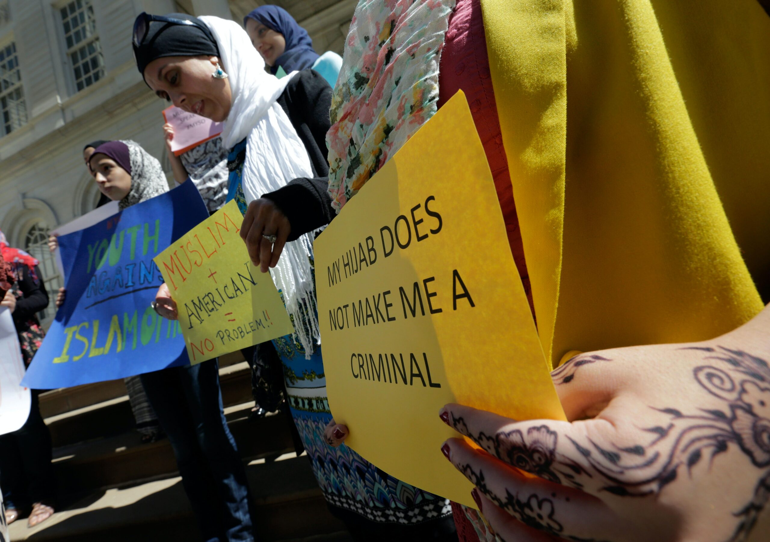 Students with the Muslim Consultative Network’s summer youth program gather on the steps of New York’s City Hall on Aug. 14, 2013, to speak out against Islamophobia.