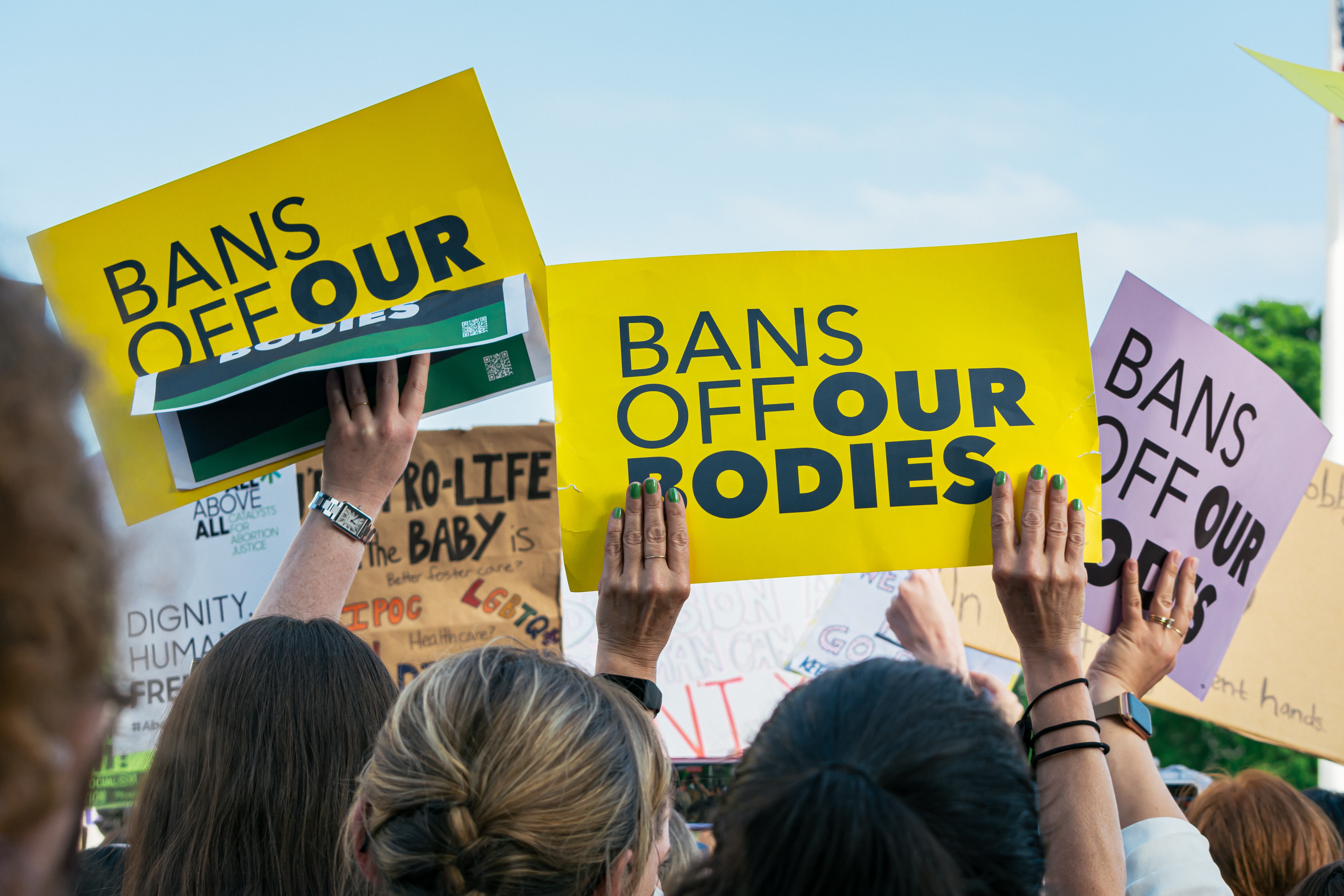 Signs say "Bans Off Our Bodies" at the Supreme Court, May 4, 2022.