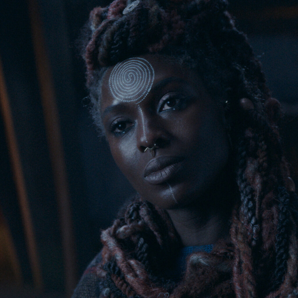 Mother Aniseya (Jodie Turner-Smith) 