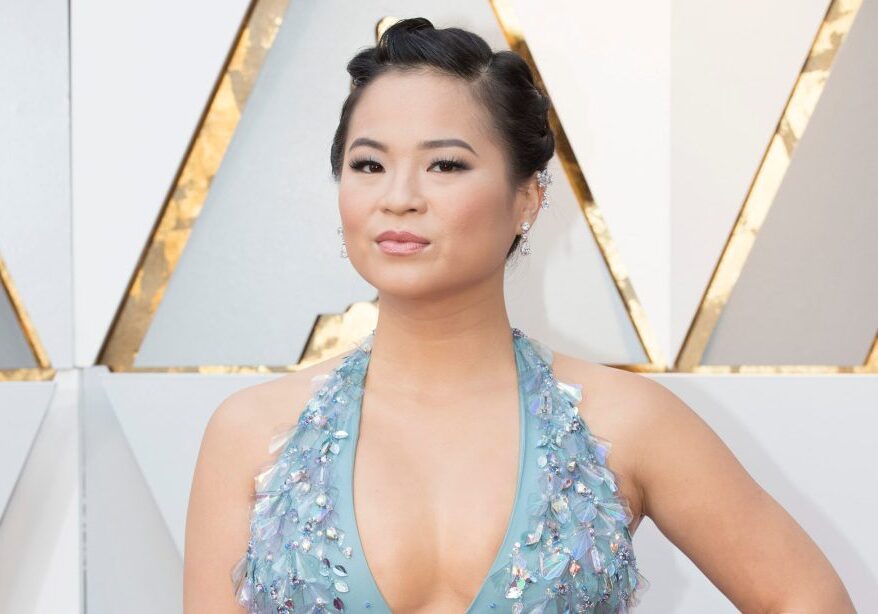 Kelly Marie Tran in a light blue gown with plunging halter neckline at the 2018 Oscars.