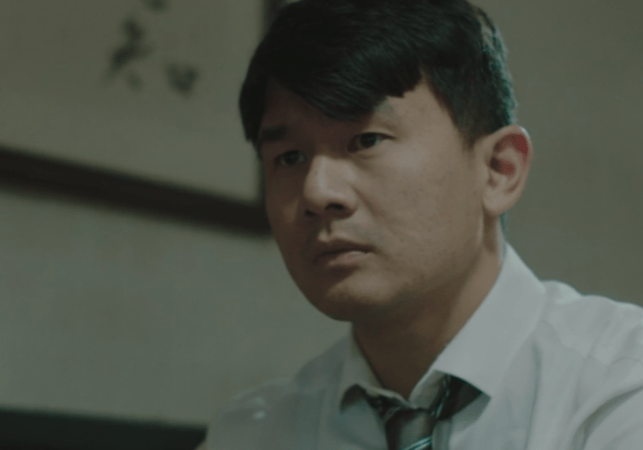 Ronny Chieng as Det. Jack Yu in A Father's Son (Photo credit: Red Rope Productions)