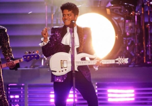 Bruno Mars channels Prince during his tribute to The Purple One. (CBS)