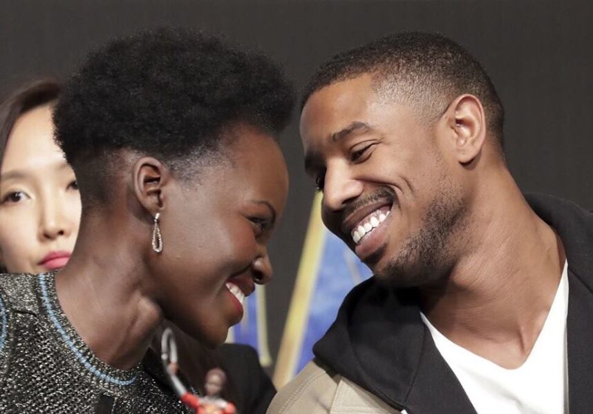 Lupita Nyong'o and Michael B. Jordan gaze at each other during the Korean press conference for Black Panther.