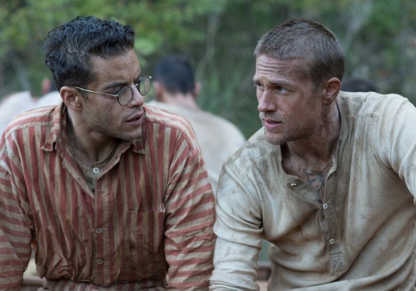 Rami  Malek  (left)  stars  as  “Louis  Dega”  and  Charlie  Hunnam  (right)  stars  as  “Henri  ‘Papillon’  Charriére”  in   director  Michael  Noer’s  PAPILLON,  a  Bleecker  Street  release.   Credit:  Jose  Haro  /  Bleecker  Street