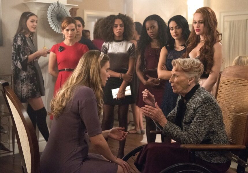 Riverdale -- "The Outsiders" -- Image Number: RVD108a_0351.jpg -- Pictured (Front L-R): Tiera Skovbye as Polly Cooper, Lili Reinhart as Betty Cooper, (Back L-): Nathalie Boltt as Penelope Blossom, Hayley Law as Valerie, Asha Bromfield as Melody, Camila Mendes as Veronica Lodge, and Madelaine Petsch as Cheryl Blossom -- Photo: Dean Buscher/The CW -- ÃÂ© 2017 The CW Network. All Rights Reserved